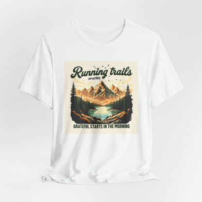 White t-shirt with a nature-themed graphic and text on a white background