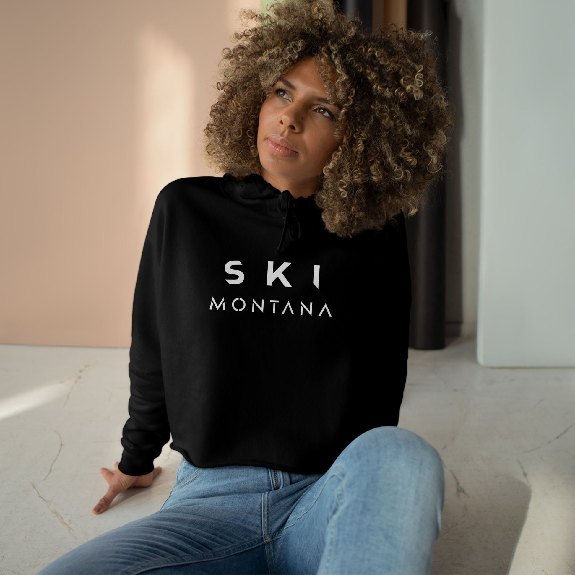 Ski Montana black cropped hoodie worn by female model - lifestyle shot