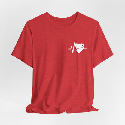 Red t-shirt with a white heart and pulse line design on a light gray background