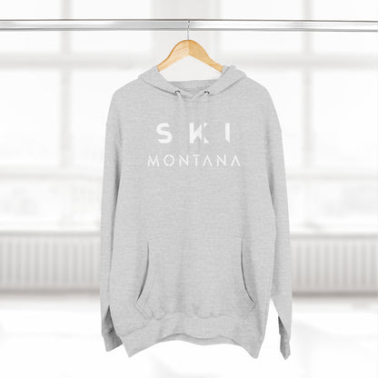 Gray hoodie with 'SKI MONTANA' text on a hanger against a white background