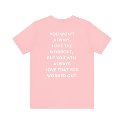 Pink t-shirt with motivational quote on a white background